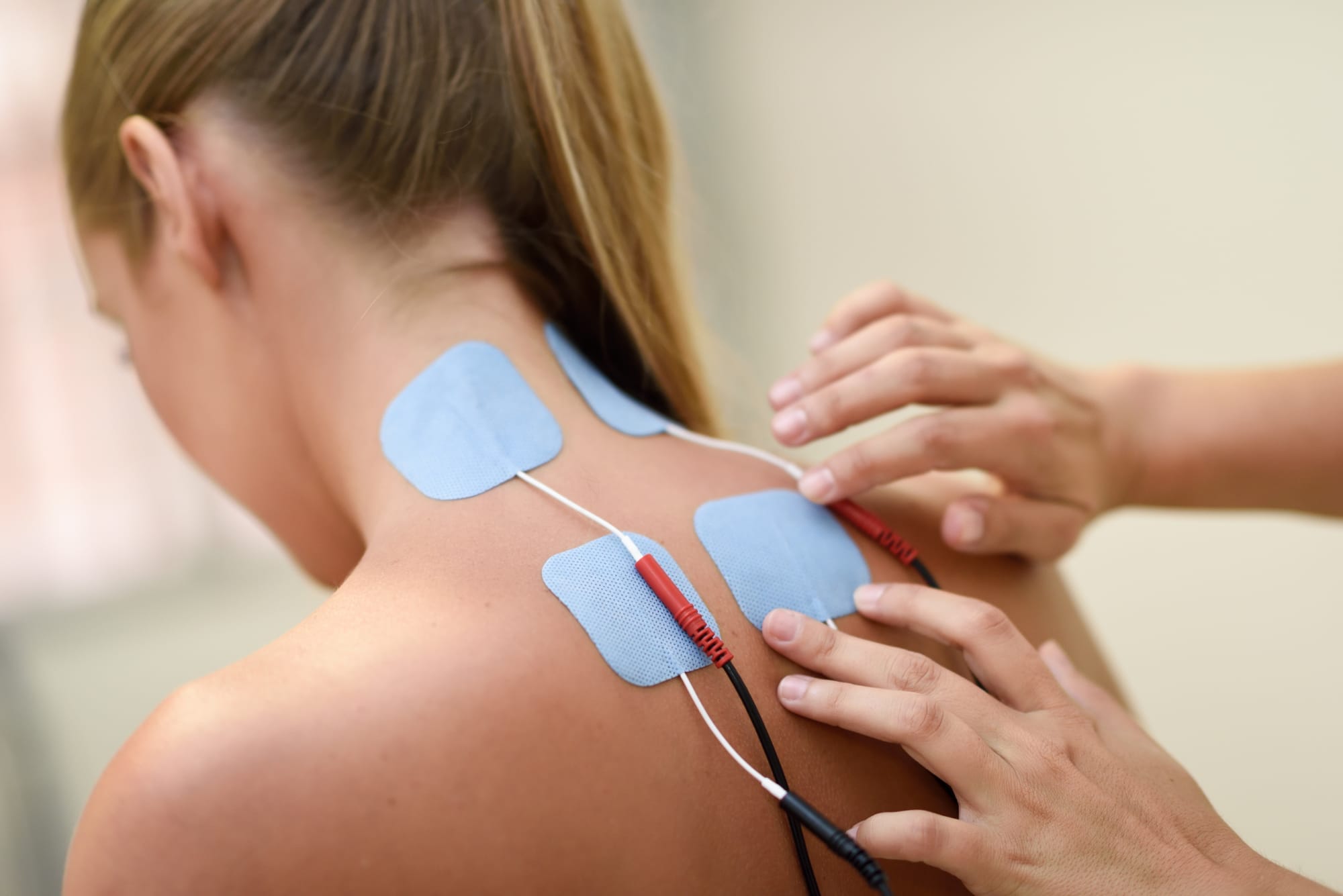 electro-stimulation-physical-therapy-young-woman.jpg
